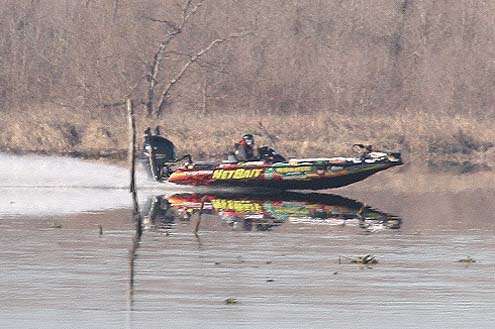 <p>
	Keith Poche runs into his backwater area on Saturday during the Bassmaster Classic.</p>
