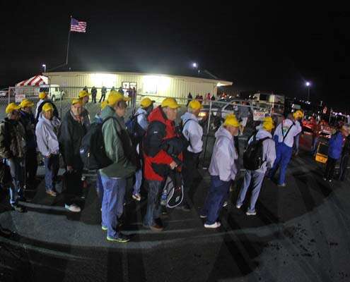 <p>
	Bassmaster Marshals wait in line to get in a boat with one of the competitors in this yearâs Bassmaster Classic.</p>
