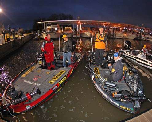 <p>
	Kevin VanDam (left) and Michael Iaconelli wait for the sun to rise on Practice Day.</p>
