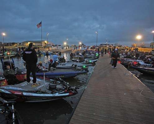 <p>
	Boats line the dock as competitors get ready for the start of the day.</p>
