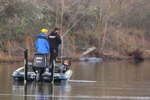 <p>
	Scroggins fishes along a backwater bank during practice Wednesday.</p>
