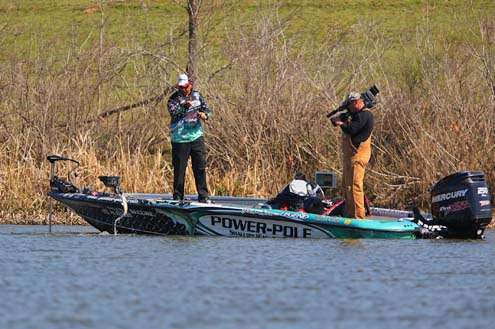 <p>
	 </p>
<p>
	Chris Lane pulls in a small keeper out of Red River Pool 4 on the final day of the Bassmaster Classic. It took Lane a couple hours to boat his first keeper. </p>
