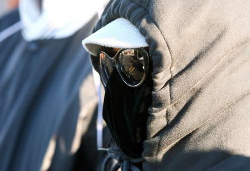 A fan is bundled up for a chilly Texas afternoon at the Bass Pro Shops.
