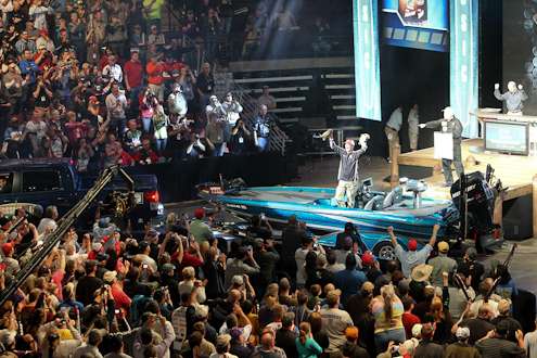 <p>
	Kevin Wirth gets a standing ovation and shows off two of his biggest bass of the day.</p>
