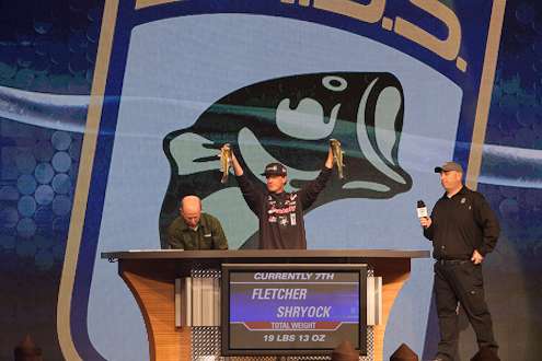 Classic rookie Fletcher Shyrock holds up his catch for the crowd during Saturday's weigh-in.
