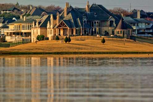 <p>
	Several large homes decorate the shoreline of Lewisville Lake. </p>
