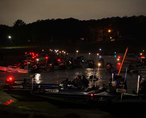 <p>
	Anglers gather in a protected cove as they wait for the launch to begin Friday.</p>
