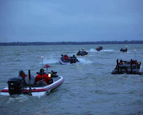 <p>
	Boats begin to idle out onto Lewisville Lake for Day Two of the Bass Pro Shops Bassmaster Central Open.</p>
