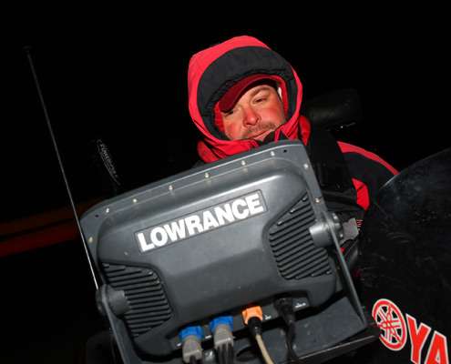 <p>
	Tournament leader Bradley Hallman prepares his electronics before launching on Lewisville Lake.</p>
