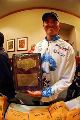 <p>
	Every angler received a plaque like this one held by Casey Ashley, commemorating their participation in the 2012 Bassmaster Classic.</p>

