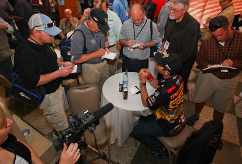 <p>
	A team of journalists circled Mike Iaconelli. </p>
