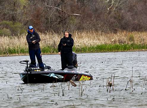Greg Vinson casts a spinnerbait with a strong wind at his back.
