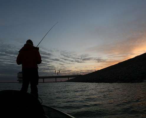 The sun rises on the start of the fish-off as Josh Bertrand prepares to make his first cast.