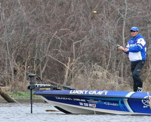 <p>
	Takahiro Omori casts a crankbait on Day One of the Bassmaster Classic.</p>
