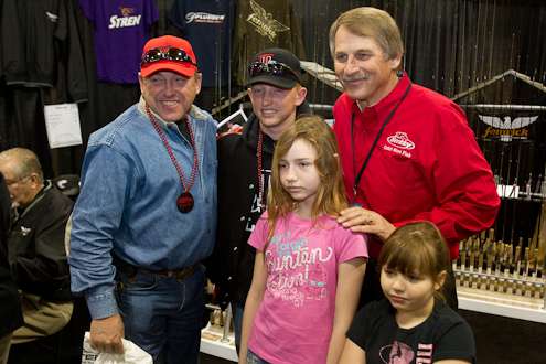 <p>
	Fan favorite Hank Parker poses with guests at the Stren booth.</p>
