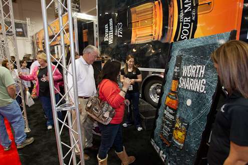 <p>
	Fans take a chance for some prizes at the Evan Williams booth.</p>
