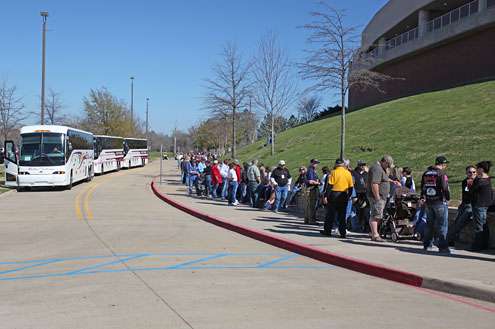 For the third straight day fans wrap around the arena, waiting to enter the Bassmaster Classic weigh-in.
