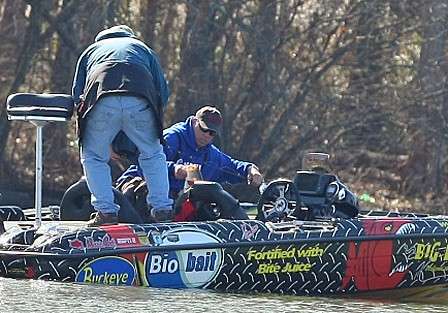 <p>
	Russ Lane hauls in a keeper in Beeswax Creek. The pressure was on as conditions stayed crowded there.</p>
