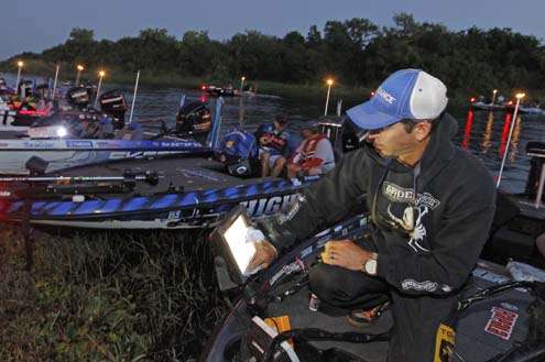 <p>
	Michael Iaconelli sets his electronics prior to the start of Day Two.</p>
