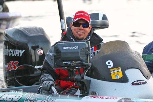<p>
	2012 Bassmaster Classic champion Chris Lane gets a big cheer as he idles by the check-out dock</p>
