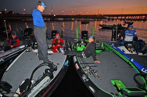 <p> 	 </p> <p> 	Greg Vinson and Scott Ashmore wait for the morning to begin.</p> 