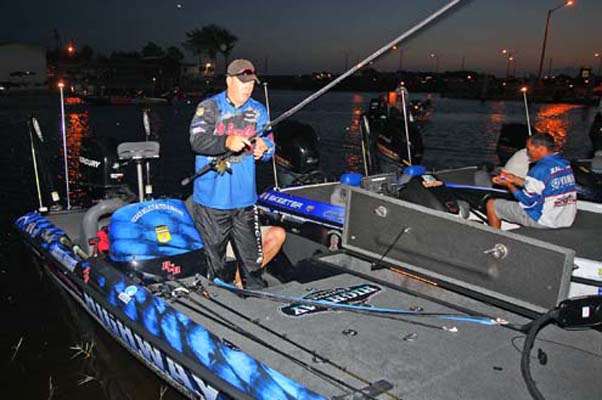 <p>
	Russell Parrish gets his tackle ready for the start of the Power-Pole Slam on Lake Okeechobee.</p>
