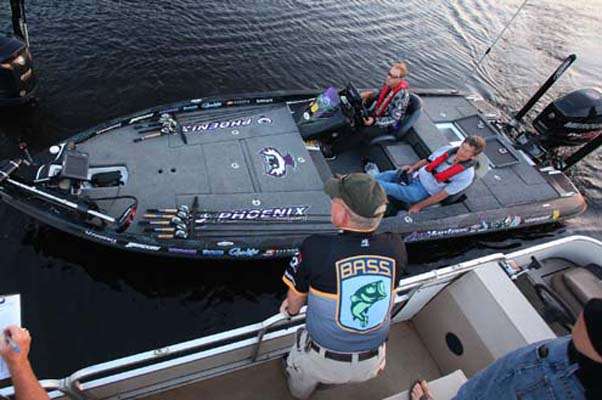 <p>
	Aaron Martens passes the check-out boat.</p>
