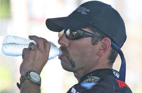 <p>
	Michael Iaconelli downs a bottle of water as soon he gets to the holding tanks.</p>
