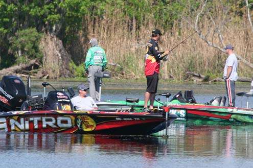 <p>
	 </p>
<p>
	Kevin VanDam fishes in the foreground, while Shaw Grisgsby looks for spawning fish behind him.</p>
