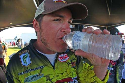 <p>
	The afternoon temperatures reached the 80s, and almost every angler who hit the tanks first grabbed a bottle of water like Derek Remitz, who quickly downed the fluid.</p>

