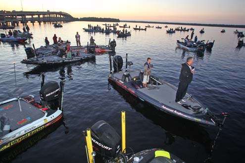 <p>
	 </p>
<p>
	Elite anglers and Marshals stand at attention for the national anthem.</p>
