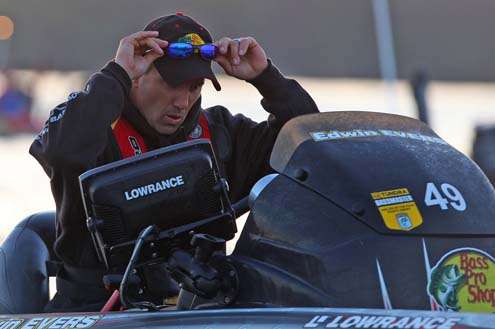 <p>
	Evers adjusts his glasses before taking off for Day Two of competition.</p>

