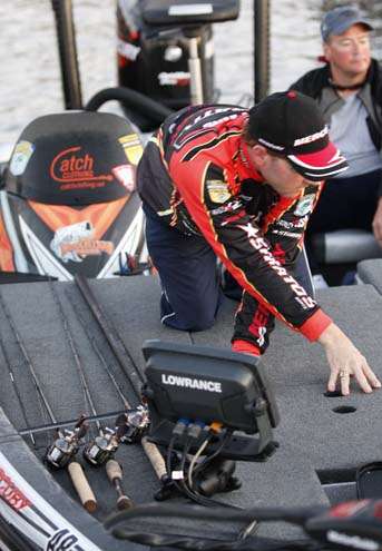 <p>
	 </p>
<p>
	Mike McClelland organizes the front of his boat prior to take-off on Day Two of the St. Johns River Showdown.</p>
