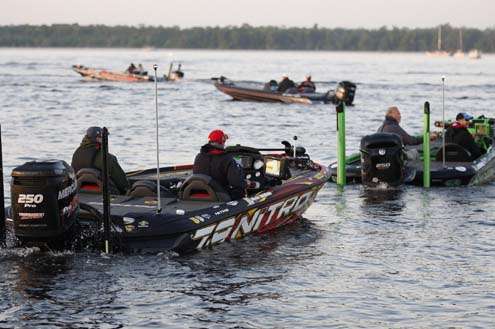<p>
	 </p>
<p>
	Kevin VanDam trails behind a line of boats headed to take-off Friday.</p>

