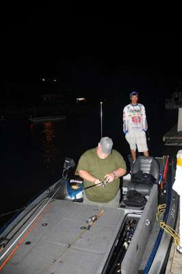 <p>
	Tim Hennemann of Kentucky gets his tackle ready for the first day of competition. His partner for the day is Floridaâs Dustin Snelson.</p>
