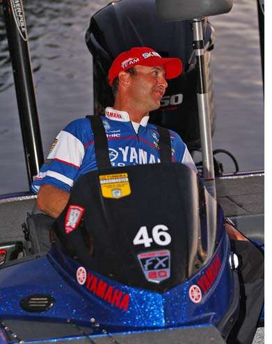 <p>
	Todd Faircloth visits with his Marshal before the start.</p>
