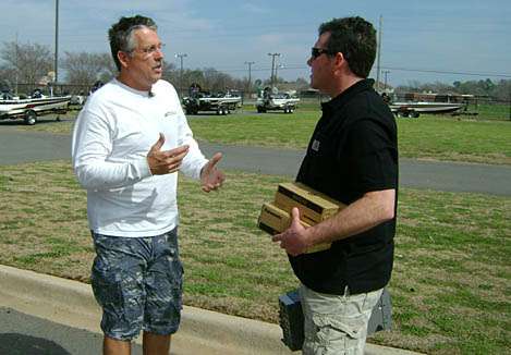 <p>
	Bassmaster TV producer Tim Schick, HD digital deck and tapes in hand, meets Camera Copter pilot Paul Barth on the afternoon before Day One of the 2012 Bassmaster Classic.</p>
