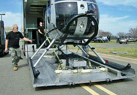 <p>
	The copter and dolly slide down the ramp to the ground.</p>
