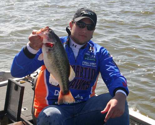 <p>
	Cody Johnston from UT-Martin holds up this big spotted bass he caught on Day One of the South Super Regional.</p>
