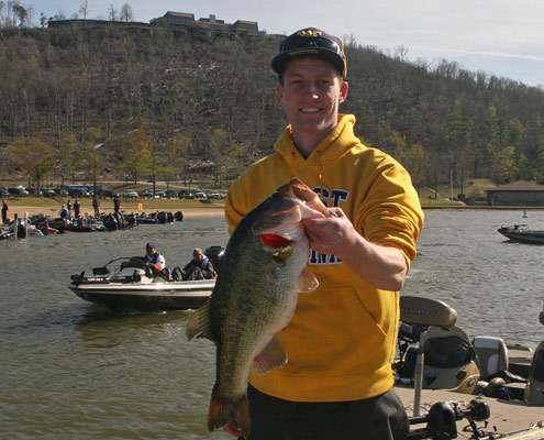 <p>
	Ed Rude shows off this nice Guntersville bass as he bags his catch during the first 2012 Carhartt College Series event.</p>
