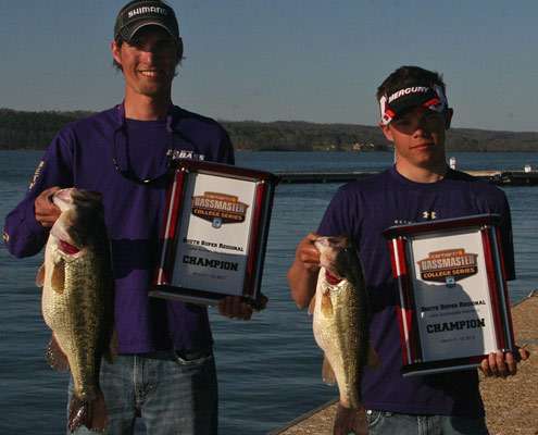 <p>
	Cody Ross and Dewey Swims from Bethel University show off their biggest bass and their first-place trophies.</p>
