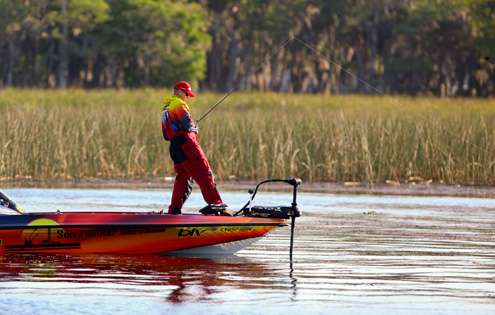 <p>
	Elite Series pro Keith Combs stops his boat to set up on a fish on Day One of the 2012 St. Johns River Showdown.</p>
