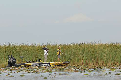 <p>
	Terry Scroggins fishes lilypads on Sunday.</p>
