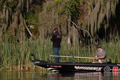 Greg Hackney starts fishing at his first stop Sunday, close to the entrance to Lake George.
