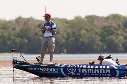 Todd Faircloth works grass mats slowly Sunday, putting together a stringer that came close to winning the event.
