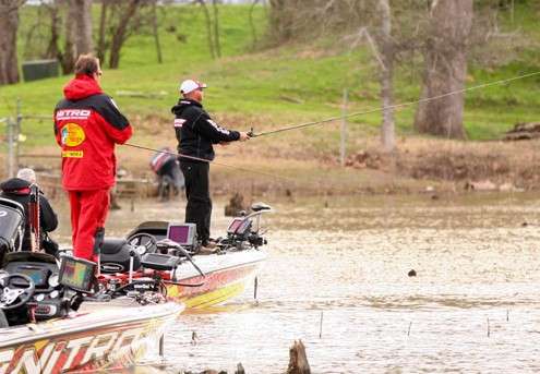 <p>
	When a spot is good, it's no secret: Kevin VanDam (foreground) and Jeff Kriet fire casts in one of the Red's many shallow, stumpy backwaters.</p>

