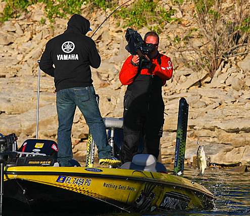 <p>
	Lane puts his third keeper fish in the boat.</p>
