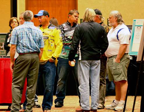<p>
	2012 Bassmaster Classic Champion, Chris Lane and brother Bobby Lane, visit with tournament participants after dinner. </p>
