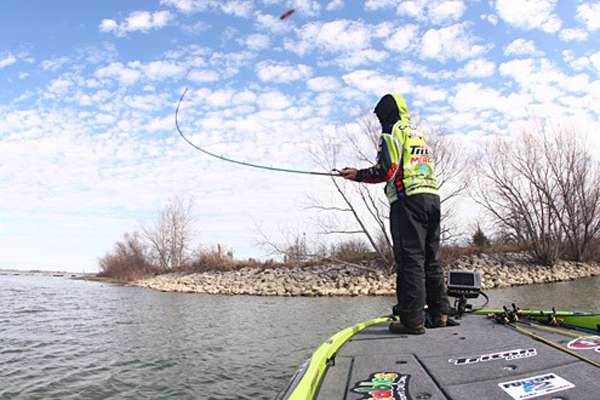 <p>
	Current AOY leader Brent Chapman casts a crankbait along a riprap wall at Lewisville Lake, Texas during the 2012 Bass Pro Shops Central Open #1. </p>
