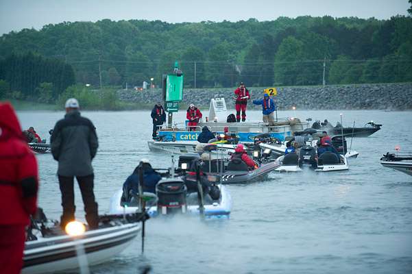 <p>
	Tournament Director Chris Bowes announces the launch order as anglers line up to start Day Two on Lake Norman.</p>
